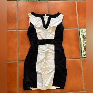 Tahari dress navy blue and white. Can dress up or dress down.